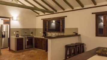 Full-sized fridge, microwave, espresso maker, cookware/dishes/utensils