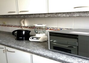 Full-size fridge, microwave, coffee/tea maker