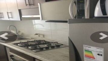 Full-sized fridge, microwave, coffee/tea maker