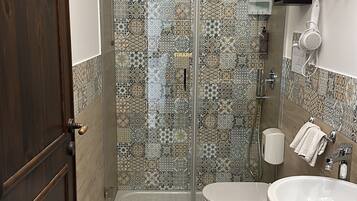 Triple Room, Balcony | Bathroom | Shower, free toiletries, hair dryer, towels