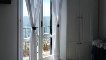 Quarto casal panorâmico, vista para o mar | Comodidades do quarto