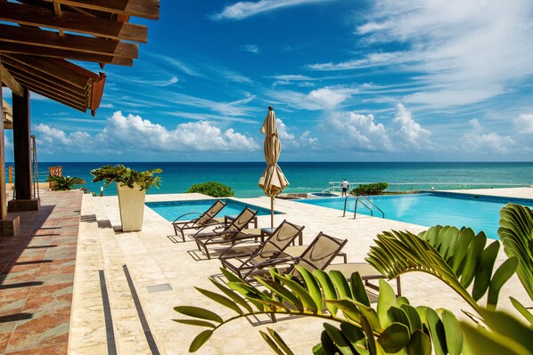 Outdoor pool, pool umbrellas, pool loungers