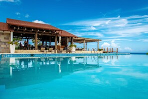 Outdoor pool, pool umbrellas, pool loungers