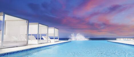 Outdoor pool, pool umbrellas, sun loungers