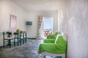 Condo (Vasiliki) | Living area | Flat-screen TV - Phoenix Beachside Condos (Velo-Vocha)