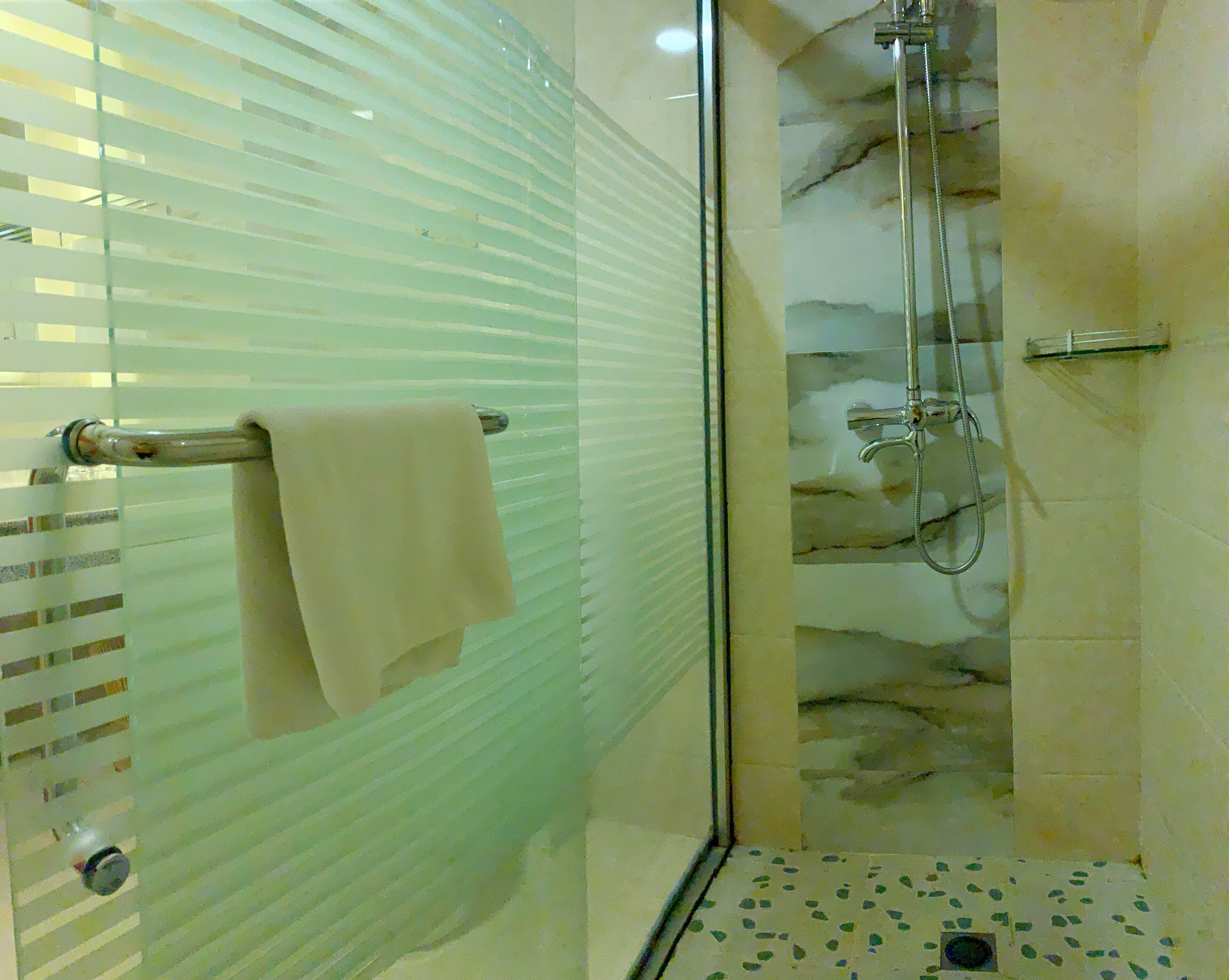 deluxe double room | bathroom | shower, rainfall showerhead, designer toiletries, hair dryer