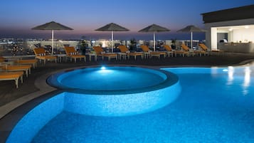 Outdoor pool, pool umbrellas, pool loungers