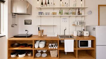 Full-size fridge, microwave, stovetop, toaster