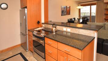 Condo, 2 Bedrooms | Private kitchen | Fridge, microwave, oven, dishwasher