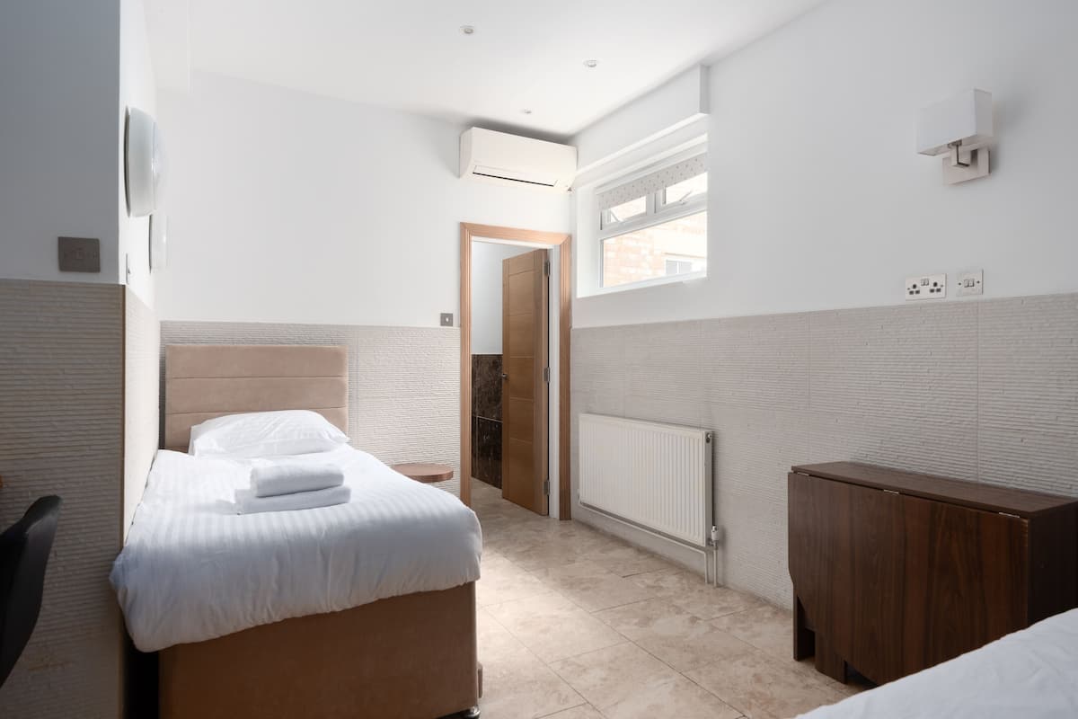 Family Apartment | Sengetøy av topp kvalitet, memory foam-senger og safe på rommet