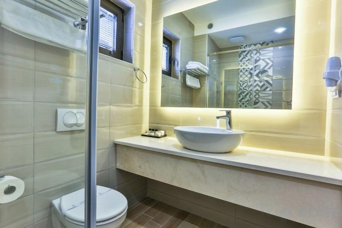 Baño | Ducha, artículos de higiene personal gratuitos y secador de pelo