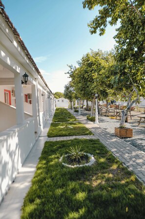 Apartment, eingeschränkter Meerblick | Wohnbereich