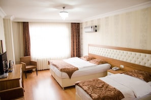 Standard Double Room | Minibar, iron/ironing board, free cribs/infant beds, free WiFi