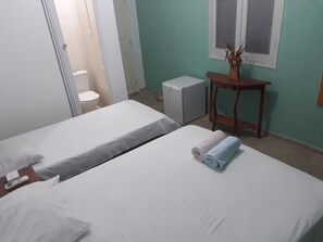 Tabla de planchar con plancha, camas extra, wifi gratis y ropa de cama 