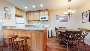 Condo, 1 Bedroom | Private kitchen | Full-size fridge, microwave, oven, stovetop