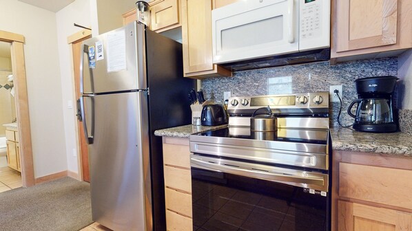 Condo, 2 Bedrooms | Private kitchen | Full-sized fridge, microwave, oven, stovetop