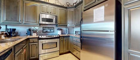 Condo, 4 Bedrooms | Private kitchen | Full-sized fridge, microwave, oven, stovetop
