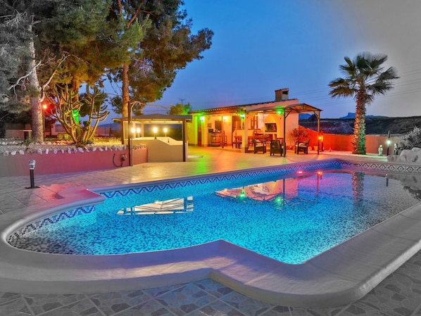 Outdoor pool, pool umbrellas, sun loungers