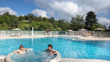 Seasonal outdoor pool, a heated pool, pool umbrellas, pool loungers