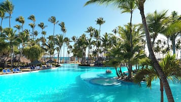 4 outdoor pools, open 8:00 AM to 6:00 PM, pool umbrellas, pool loungers