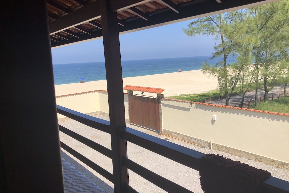 Quarto quádruplo luxo, várias camas, vista parcial para o oceano | Vista do quarto