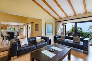 Three Bedroom Luxury 13908 | Living room | TV - San Lameer Villa Rentals Three Bedroom Luxury 13908 (Southbroom)