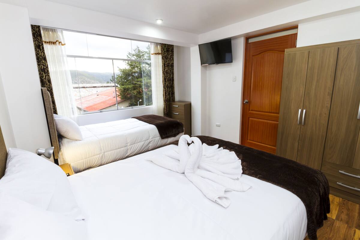 Triple Room, Multiple Beds | Iron/ironing board (on request), WiFi (free), bed sheets