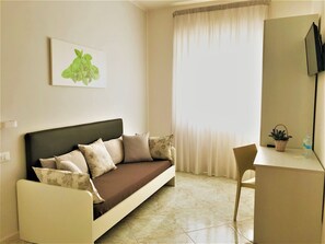 Deluxe Suite | Living area | Flat-screen TV - Innsud - Salentobedrooms (Nardò)