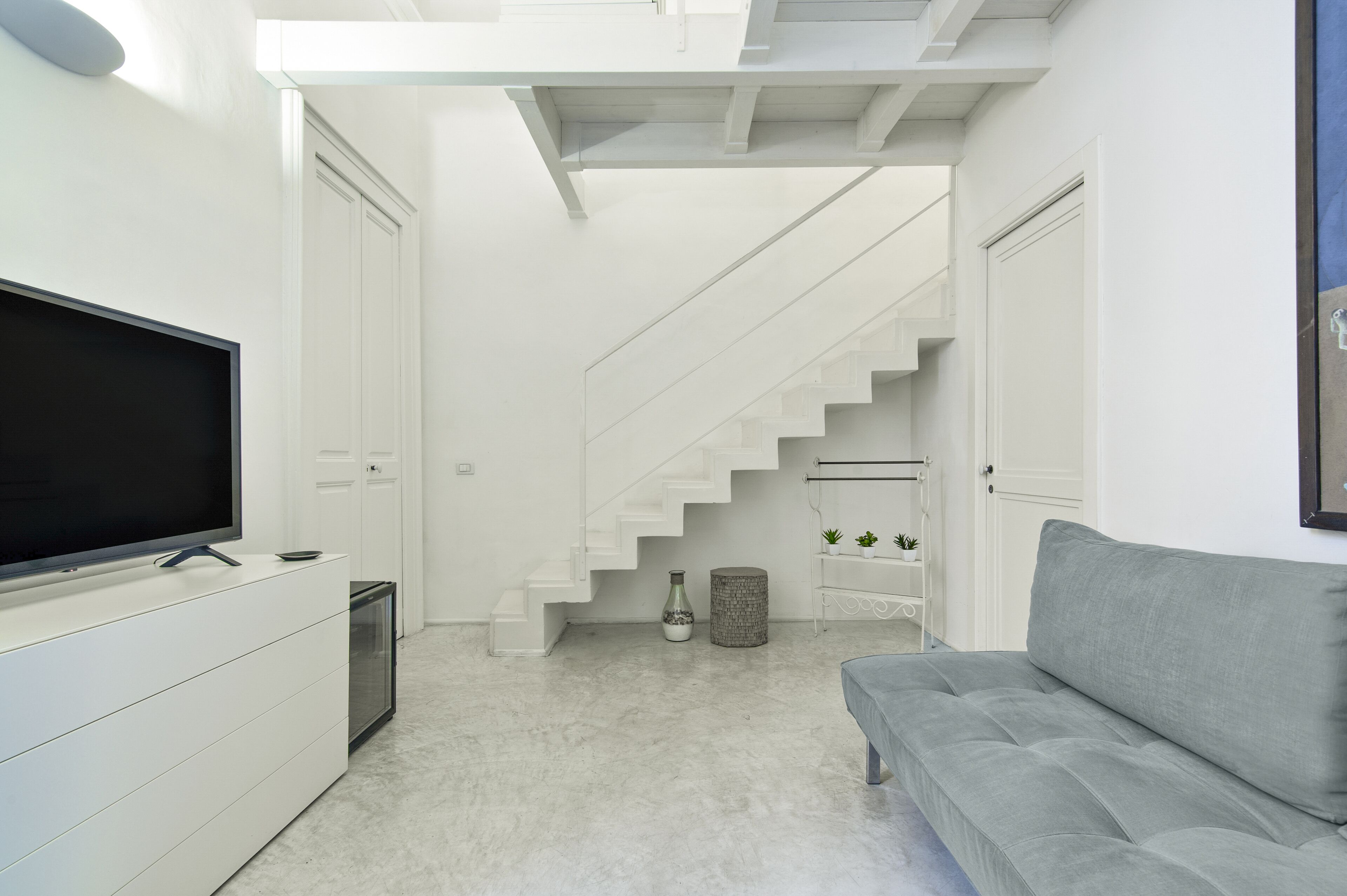 Suite Design, 1 letto queen con divano letto, non fumatori, bagno in camera | Area soggiorno