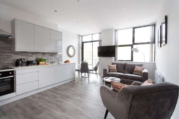 Executive Apartment, 2 Bedrooms, Kitchen, City View | Living area | 50-inch Smart TV with satellite channels, TV