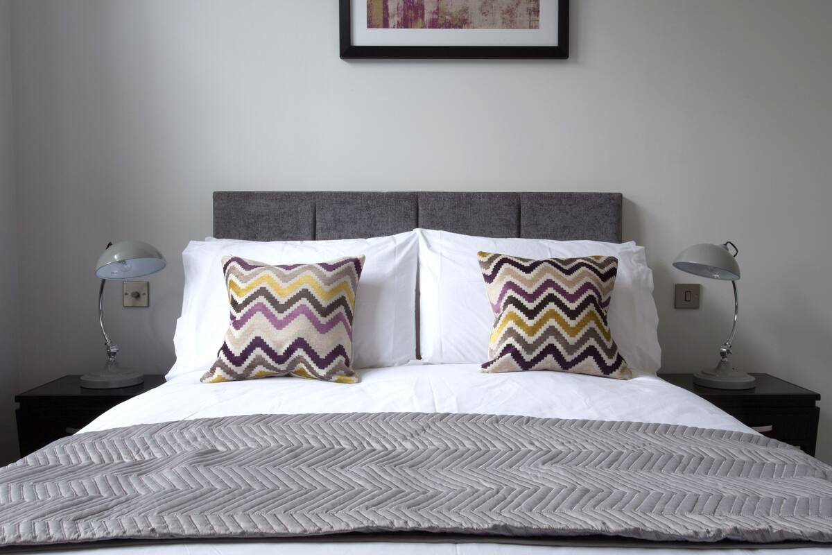 1 bedroom, premium bedding, laptop workspace, blackout drapes