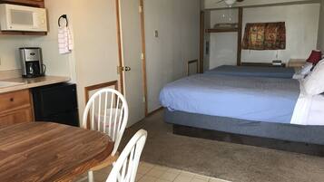 Traditional Double Room, 2 Queen Beds | 2 bedrooms, individually decorated, individually furnished, free WiFi