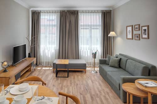 Appartamento Deluxe, 1 camera da letto | Area soggiorno | TV