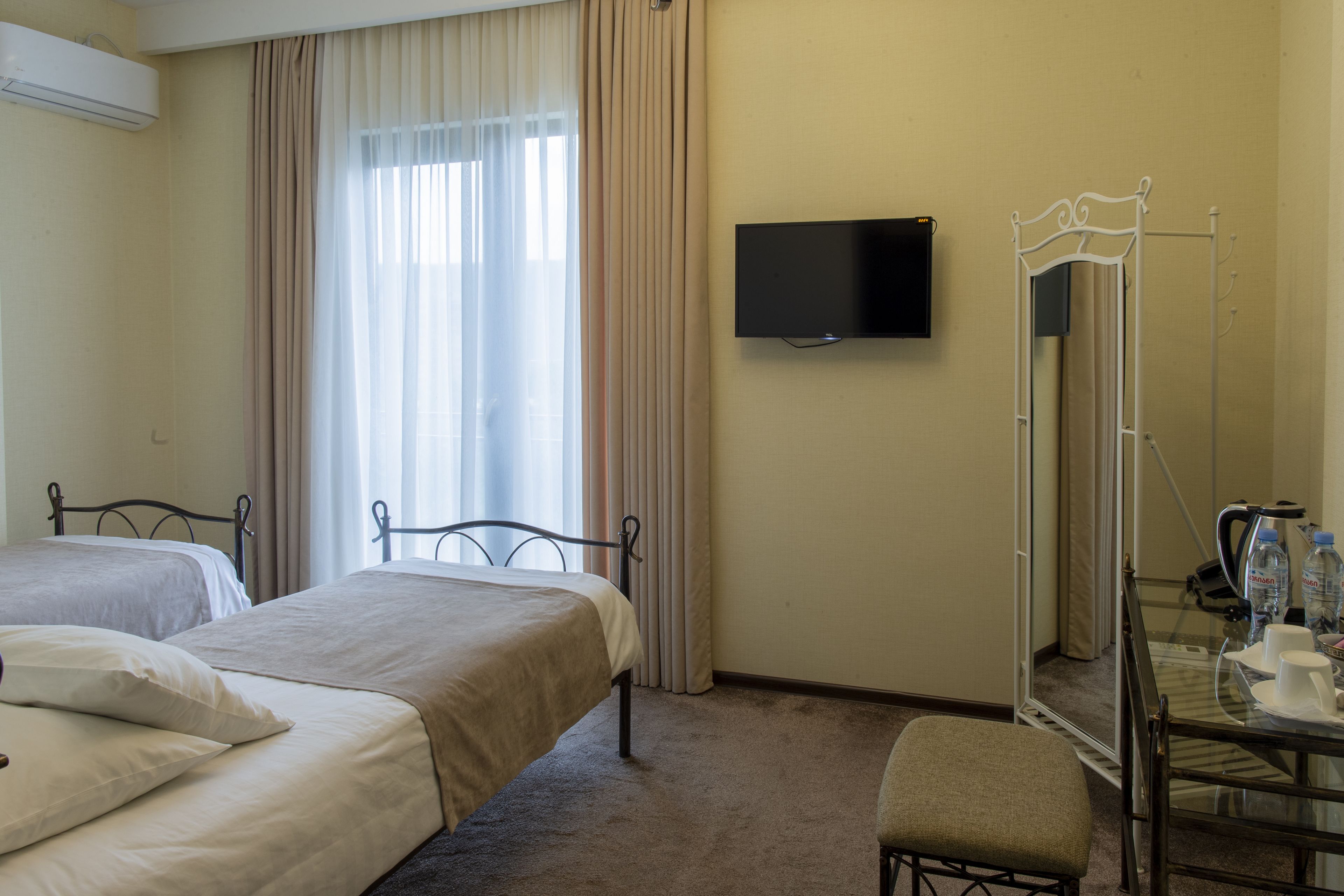 classic twin room, 1 bedroom, garden view, corner | 1 bedroom, minibar, in-room safe, desk