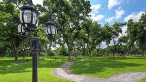 A park pathway with lampposts and trees. - 5 O'Clock Somewhere! WWH302 Apartment 2 New (New Braunfels)