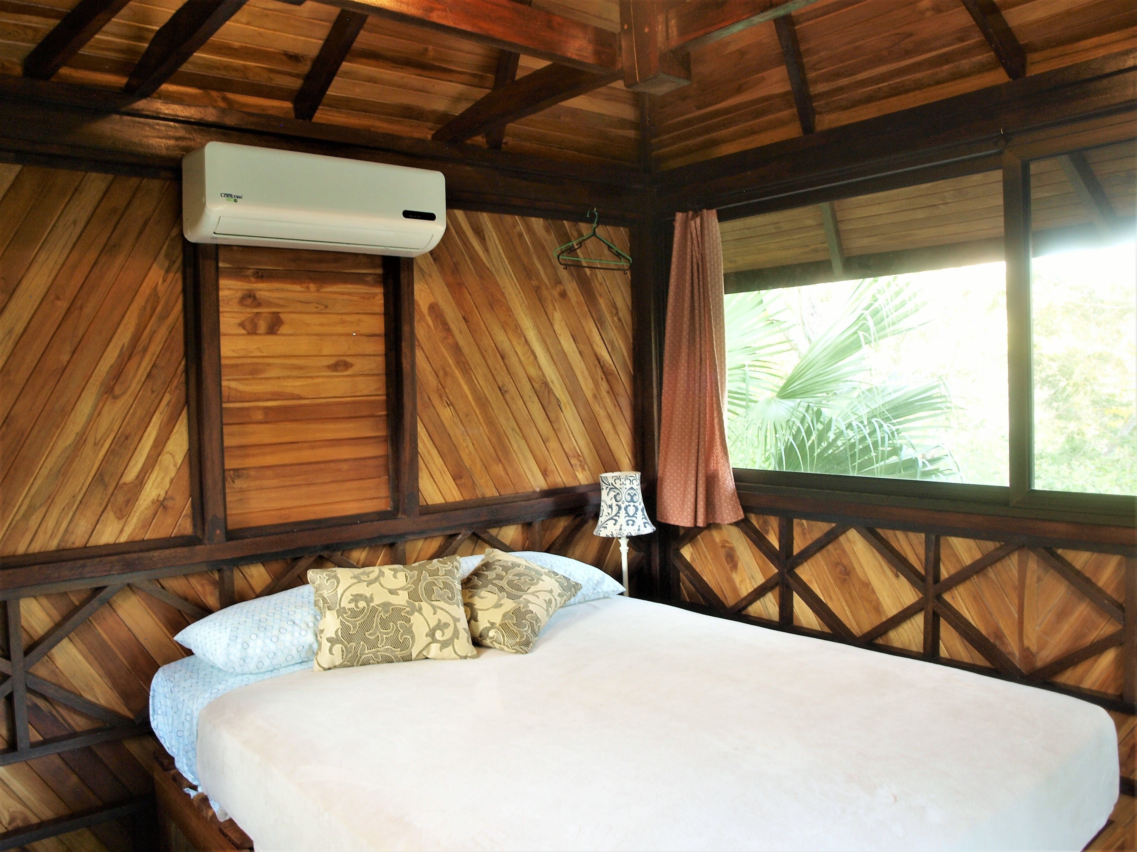 deluxe cabin, 1 queen bed, private bathroom, mountain view | soundproofing, free wifi, bed sheets