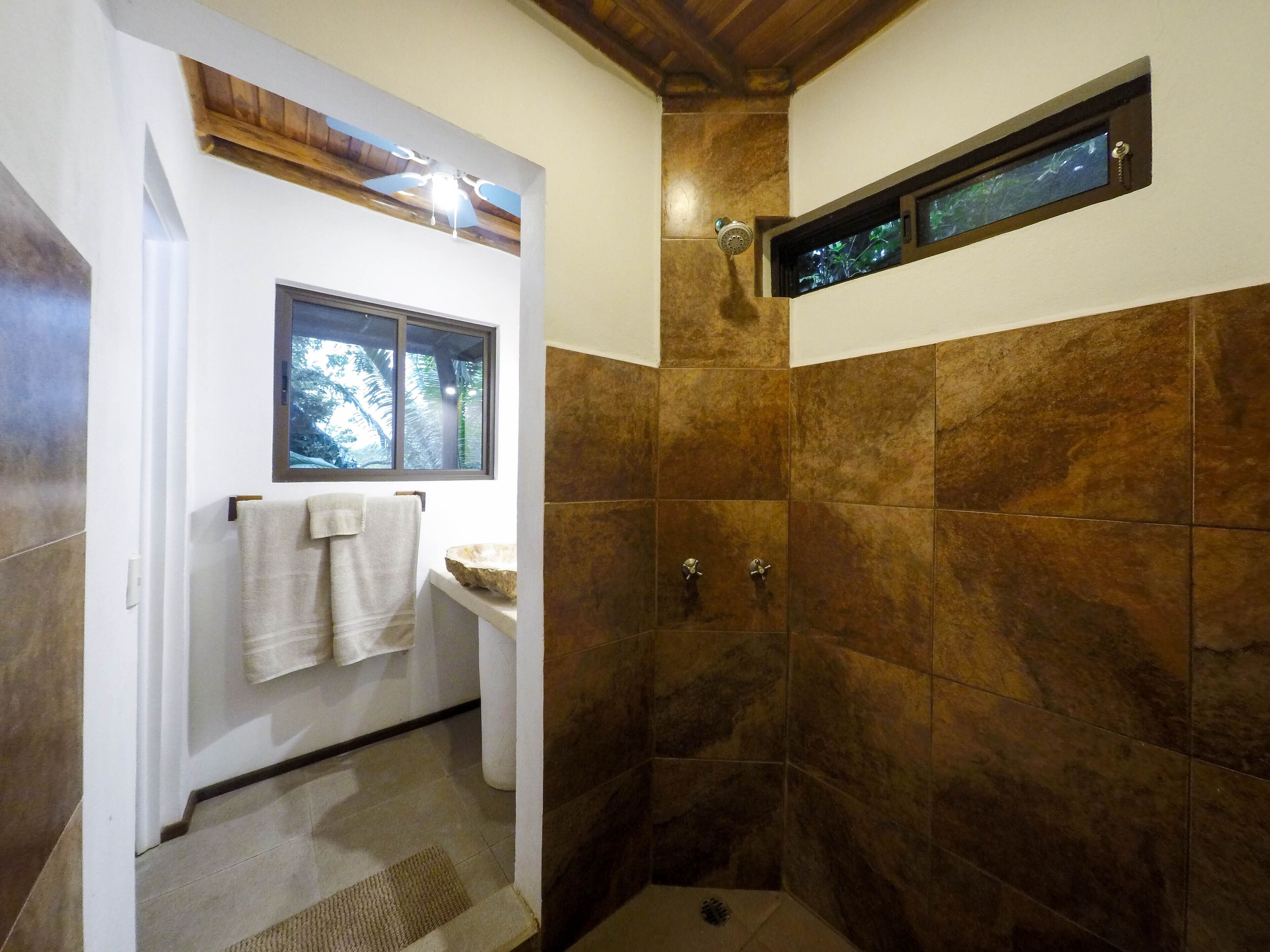 premium bungalow, 1 king bed, non smoking, mountain view | bathroom | shower, free toiletries, hair dryer, towels