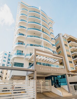 A multi-story building with balconies and a sign reading "Central Park Tower". - Central Park Tower (Santo Domingo)