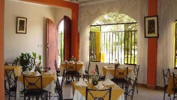 Breakfast, lunch, dinner served; local and international cuisine