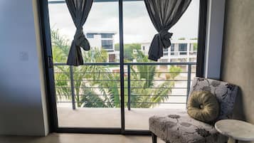 Luxury Room, 1 Queen Bed, Balcony (Stone Room) | Living area | 32-inch flat-screen TV with cable channels