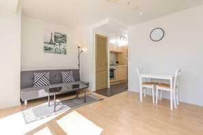 Modern 2 Bedroom Apartment with a Balcony | Living area | Flat-screen TV