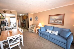 Living area - Stylish, eclectic 1 bedroom oceanfront condo with free WiFi, flat screen televisions, and a spectacular view of the ocean located in quiet midtown and only steps from the beach! (Ocean City)