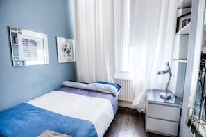 Appartement, 2 chambres | 2 chambres, fer et planche à repasser, accès au Wi-Fi (inclus)