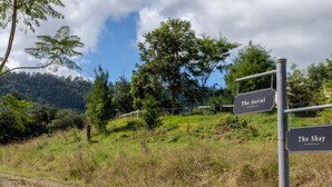A signpost with directions to 'The Aerial' and 'The Shay'. - Country Mile Escape (Flying Fox)