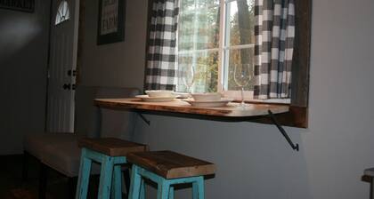 Tiny Red Farmhouse centrally located in Columbia Falls