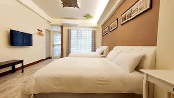 Standard Quadruple Room | Desk, blackout drapes, free WiFi, bed sheets