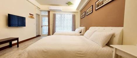 Standard Quadruple Room | Desk, blackout curtains, free WiFi, bed sheets
