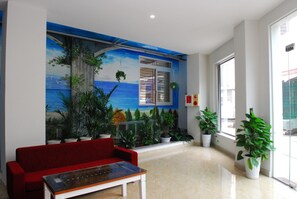 Coin salon dans le hall