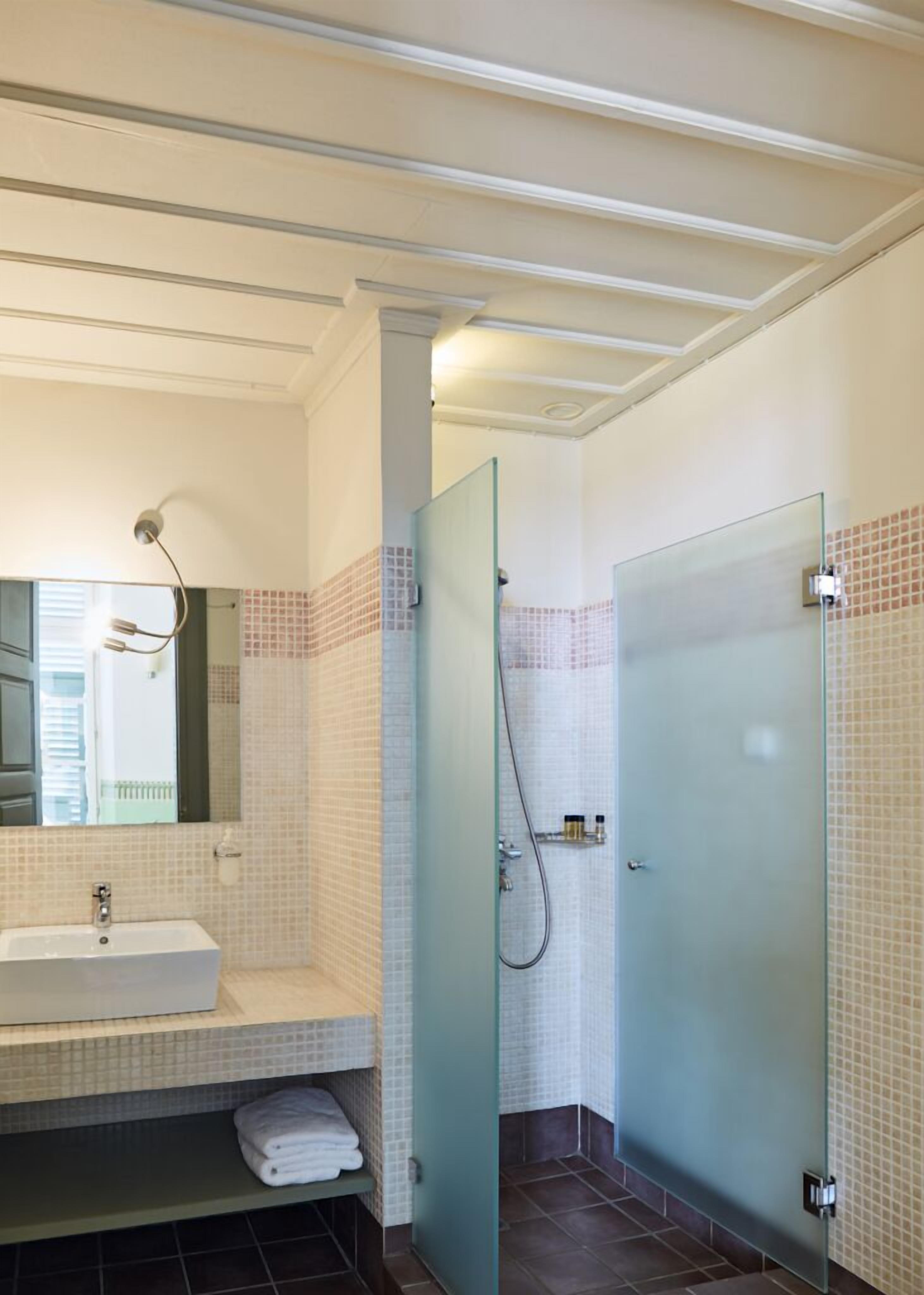 sea view, two bedroom, mezzanine suite | bathroom | shower, hair dryer, towels