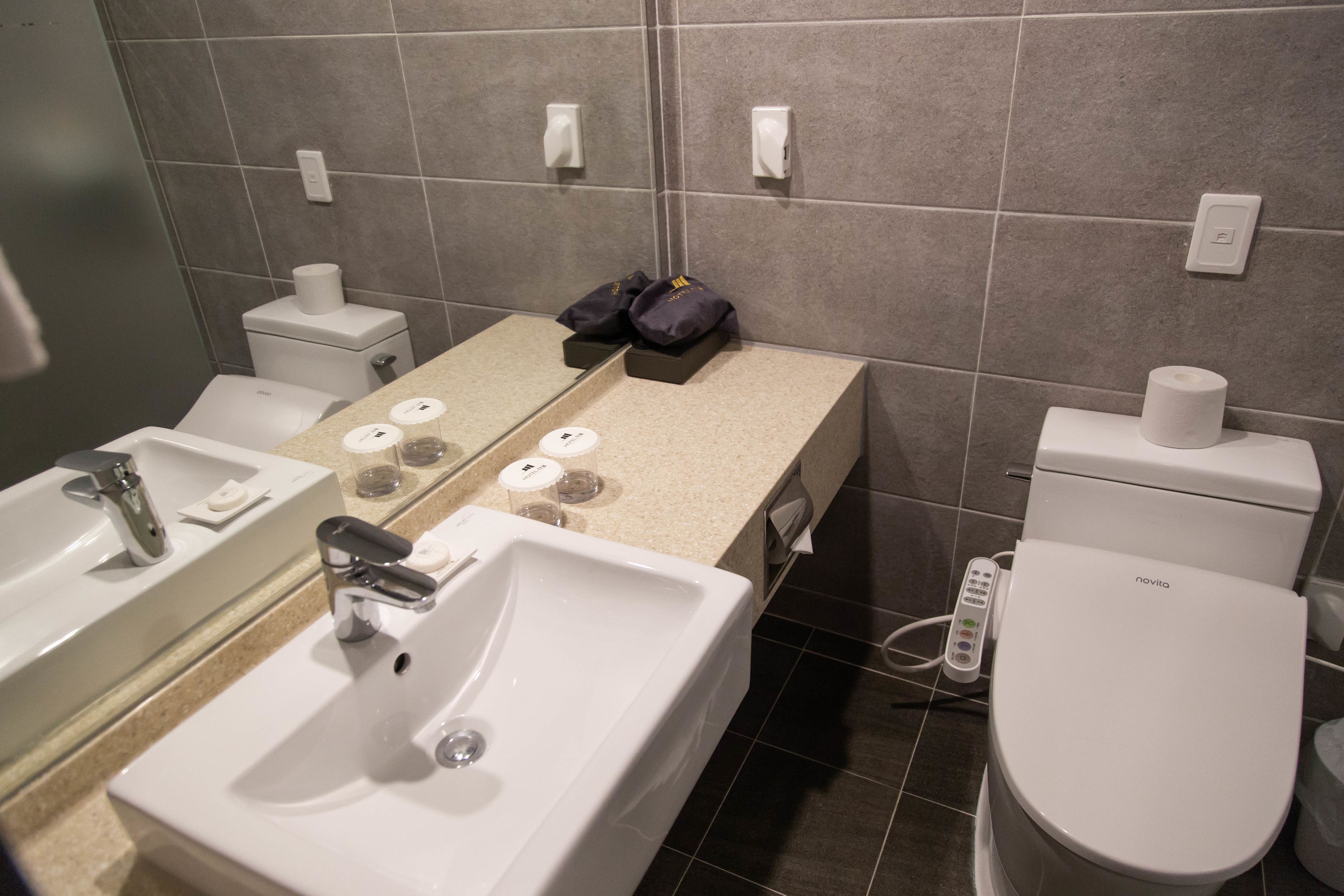 economy twin room | bathroom | hair dryer, bathrobes, slippers, bidet